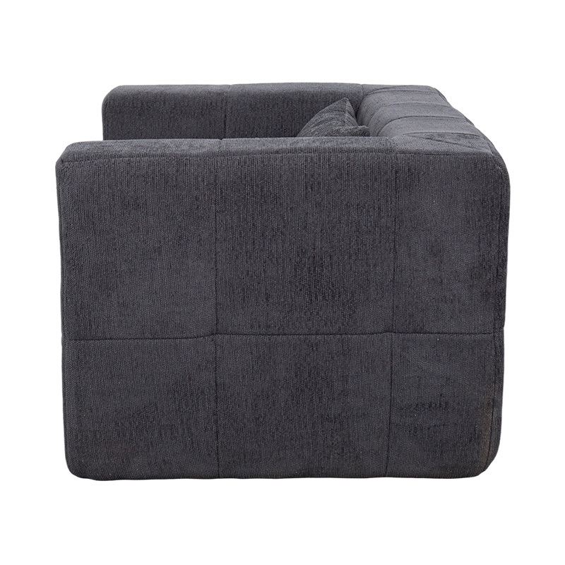 Enkel loungesoffa i helskum med mörkgrå sammet och geometrisk blockdesign Enkel loungesoffa i helskum med mörkgrå sammet och geometrisk blockdesign