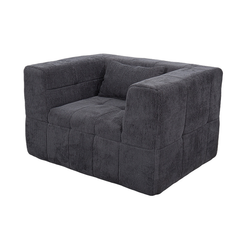 Enkel loungesoffa i helskum med mörkgrå sammet och geometrisk blockdesign Enkel loungesoffa i helskum med mörkgrå sammet och geometrisk blockdesign